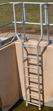 An aluminum fixed ladder at a wastewater treatment plant.