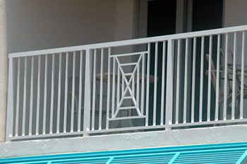 A designed Architectural Handrail on a hotel balcony.